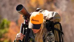 medium_cropped_wide-public-content-images-2024-01-burris_signature_hd_spotting_scope_lady_hiking_.webp.png