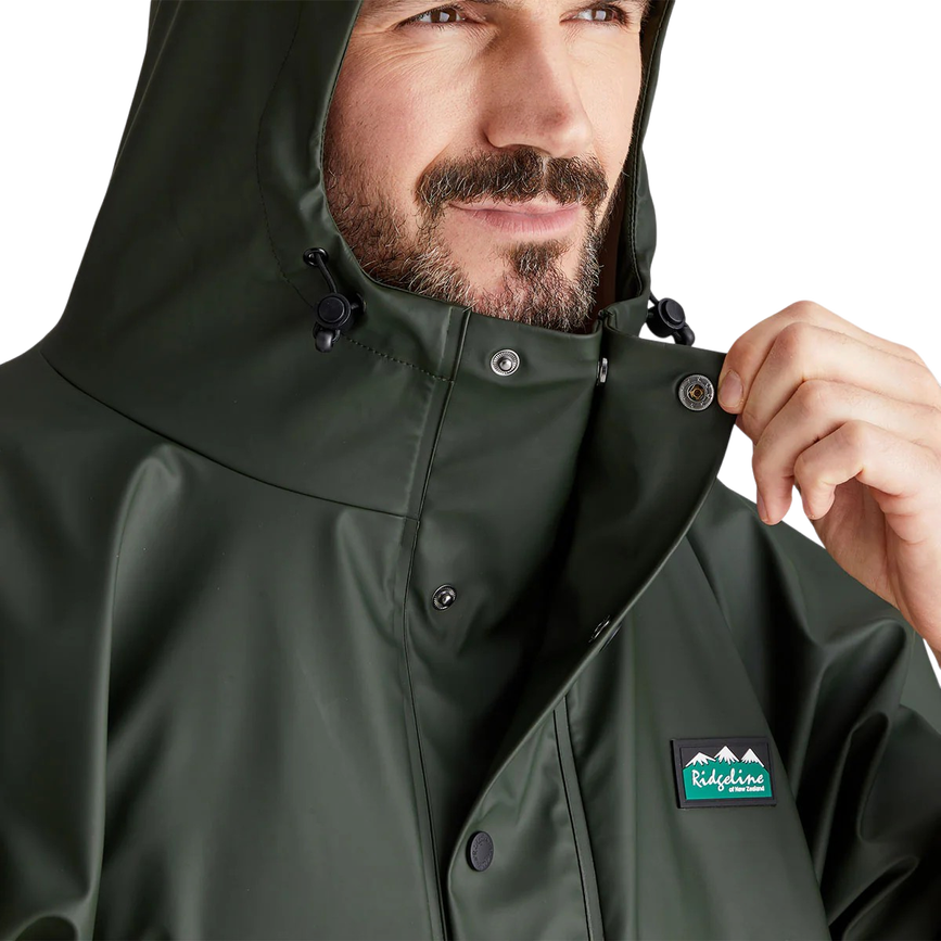 u_signature_poncho_deep_forest_button_detail-1200px.png