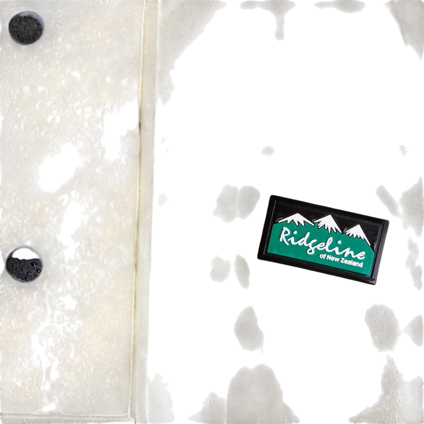 u_signature_poncho_teak_rain_detail-1200px.png